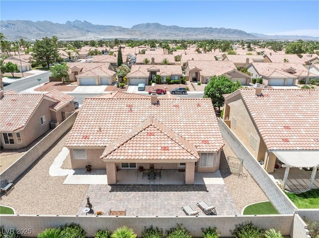 5704 Owl Butte Ct, Las Vegas, NV 89149 - aerial perspective of suburban area with a mountainous background