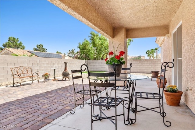 5704 Owl Butte Ct, Las Vegas, NV 89149 - fenced backyard with a patio