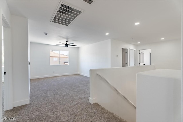 1136 Casady Hollow Ave, Henderson, NV 89012 - hall with light colored carpet, an upstairs landing, baseboards, and recessed lighting