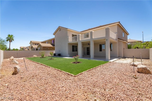 1136 Casady Hollow Ave, Henderson, NV 89012 - back of house with a balcony, a ceiling fan, stucco siding, and a patio area
