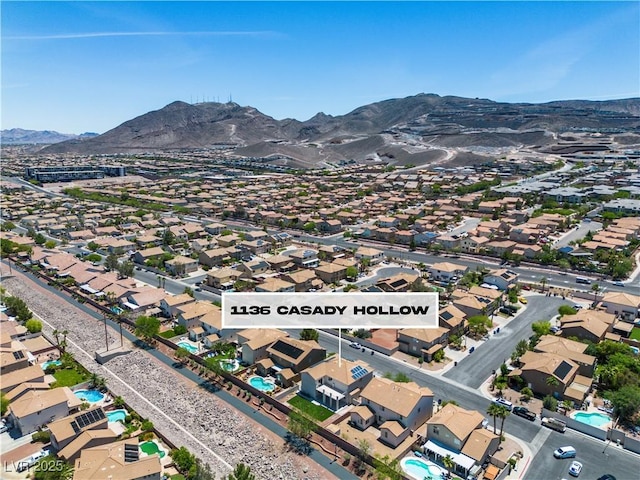 1136 Casady Hollow Ave, Henderson, NV 89012 - aerial view of property's location featuring mountains and nearby suburban area