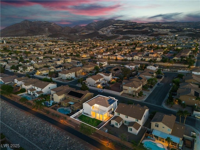 1136 Casady Hollow Ave, Henderson, NV 89012 - aerial view at dusk of a mountain view and a residential view