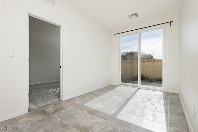 1185 Via Dimartini, Henderson, NV 89052 - spare room with baseboards and stone finish flooring