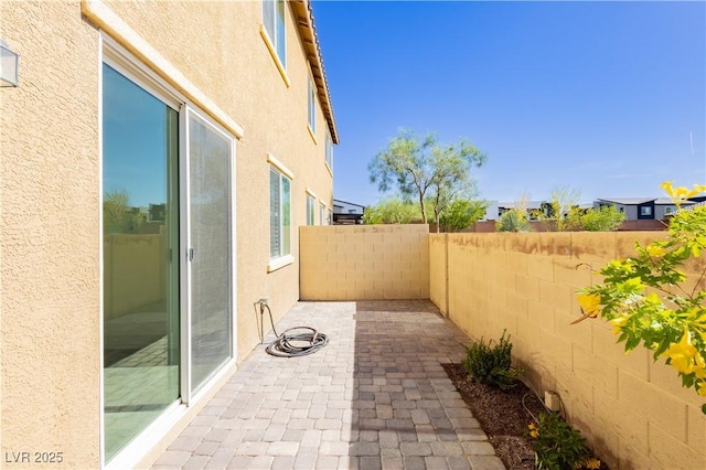 1185 Via Dimartini, Henderson, NV 89052 - fenced backyard featuring a patio area