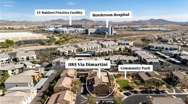 1185 Via Dimartini, Henderson, NV 89052 - aerial perspective of suburban area with a mountain backdrop