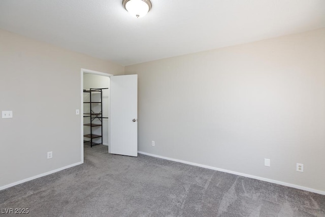 5259 Caspian Springs Dr Unit 203, Las Vegas, NV 89120 - unfurnished bedroom featuring carpet flooring and baseboards