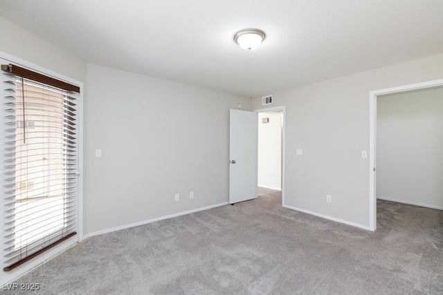 5259 Caspian Springs Dr Unit 203, Las Vegas, NV 89120 - unfurnished bedroom with carpet flooring and baseboards