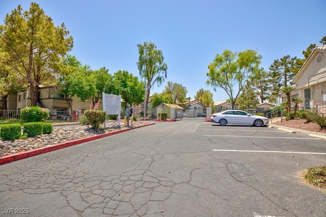 5259 Caspian Springs Dr Unit 203, Las Vegas, NV 89120 - view of asphalt street featuring a residential view and curbs