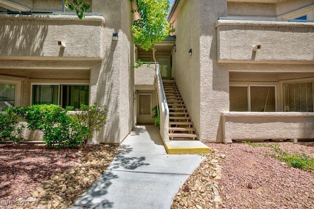 5259 Caspian Springs Dr Unit 203, Las Vegas, NV 89120 - entrance to property with stucco siding