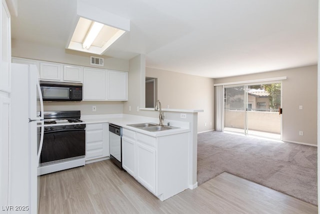 5259 Caspian Springs Dr Unit 203, Las Vegas, NV 89120 - kitchen with white appliances, a sink, a peninsula, light countertops, and open floor plan