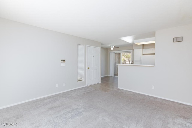 5259 Caspian Springs Dr Unit 203, Las Vegas, NV 89120 - carpeted empty room with baseboards and a ceiling fan