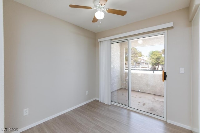 5259 Caspian Springs Dr Unit 203, Las Vegas, NV 89120 - empty room with wood finished floors, a ceiling fan, and baseboards