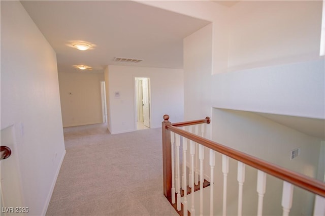 185 Camrose St, Henderson, NV 89074 - hall with an upstairs landing, light colored carpet, and baseboards