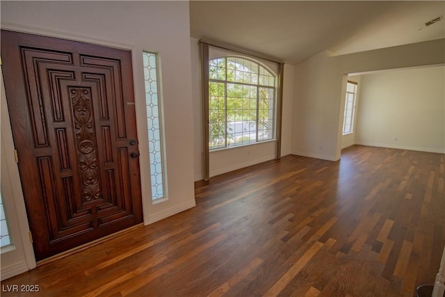 185 Camrose St, Henderson, NV 89074 - foyer featuring dark wood finished floors, vaulted ceiling, and baseboards