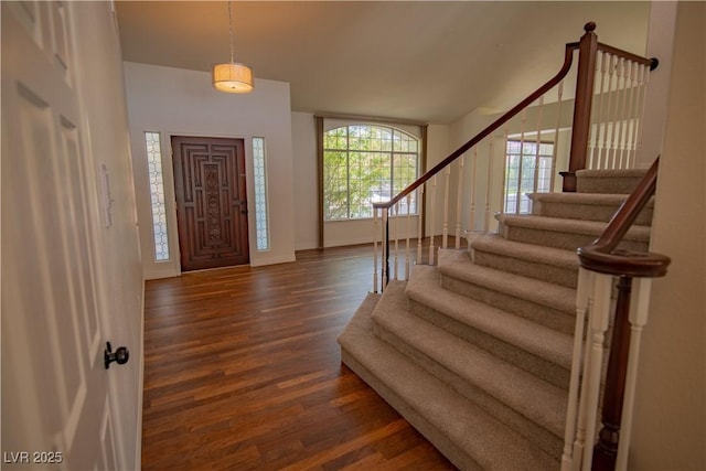 185 Camrose St, Henderson, NV 89074 - entrance foyer featuring stairs, dark wood-style floors, baseboards, and vaulted ceiling