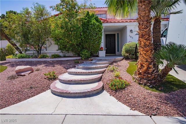 185 Camrose St, Henderson, NV 89074 - entrance to property with stucco siding and a tiled roof