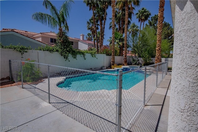 185 Camrose St, Henderson, NV 89074 - view of swimming pool with a fenced backyard, a pool with connected hot tub, and a patio area