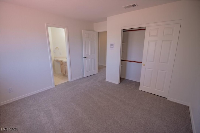 185 Camrose St, Henderson, NV 89074 - unfurnished bedroom featuring light colored carpet, a closet, and baseboards
