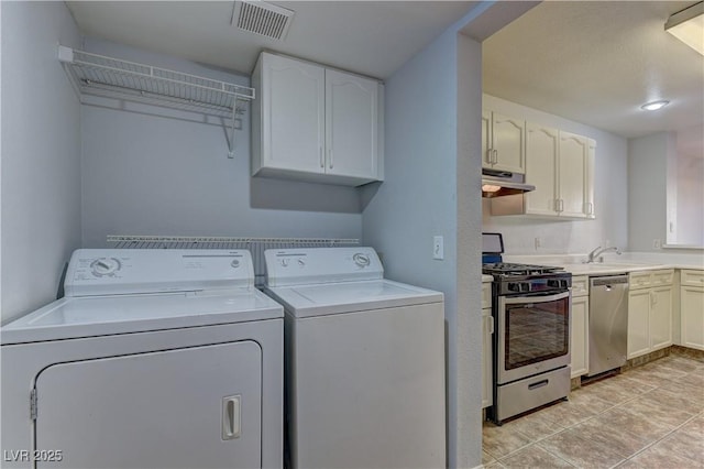 7968 Lisa Dawn Ave, Las Vegas, NV 89147 - laundry room with washer and clothes dryer