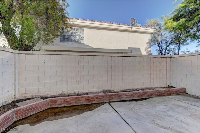 7968 Lisa Dawn Ave, Las Vegas, NV 89147 - fenced backyard featuring a patio area