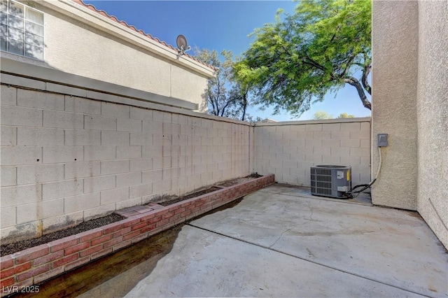 7968 Lisa Dawn Ave, Las Vegas, NV 89147 - fenced backyard with central AC and a patio