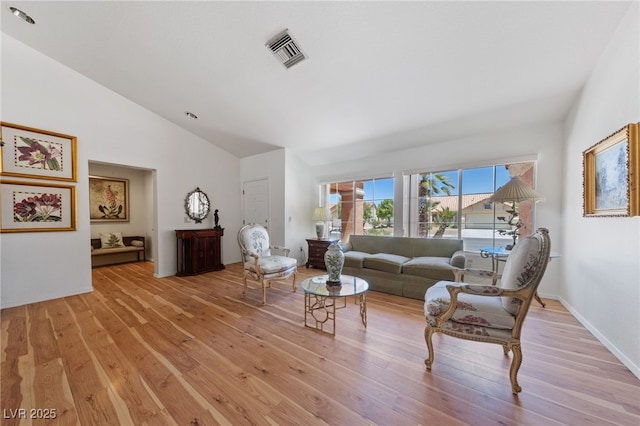 2925 Lotus Hill Dr, Las Vegas, NV 89134 - living area with light wood-type flooring and high vaulted ceiling