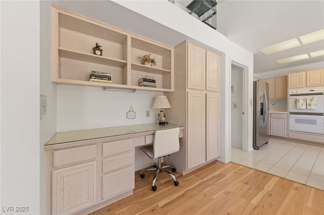 2925 Lotus Hill Dr, Las Vegas, NV 89134 - office with built in desk and light wood-style flooring