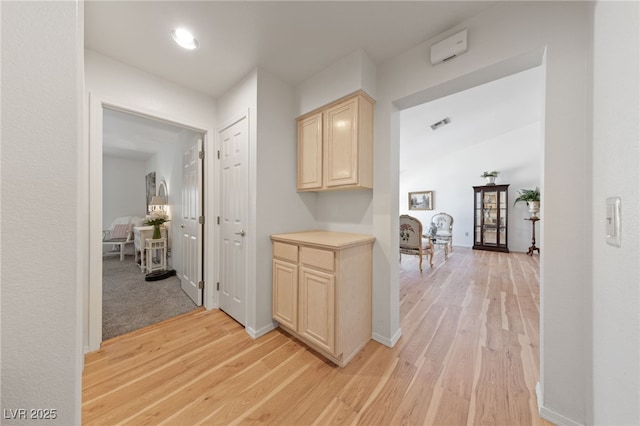 2925 Lotus Hill Dr, Las Vegas, NV 89134 - hall featuring light wood-style floors and baseboards