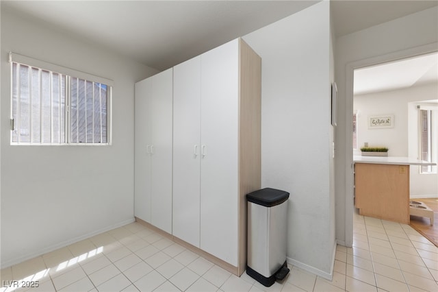 2925 Lotus Hill Dr, Las Vegas, NV 89134 - unfurnished bedroom featuring light tile patterned floors and baseboards