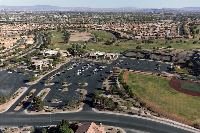2925 Lotus Hill Dr, Las Vegas, NV 89134 - aerial overview of property's location featuring a mountain backdrop and nearby suburban area