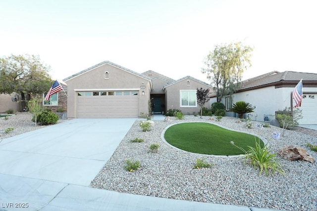 2623 Red Planet St, Henderson, NV 89044 - ranch-style home featuring a garage, driveway, and stucco siding