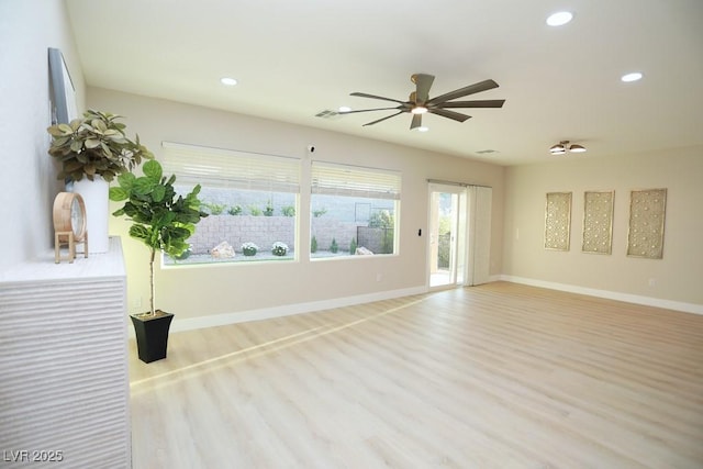 2623 Red Planet St, Henderson, NV 89044 - unfurnished room with wood finished floors, ceiling fan, recessed lighting, and baseboards