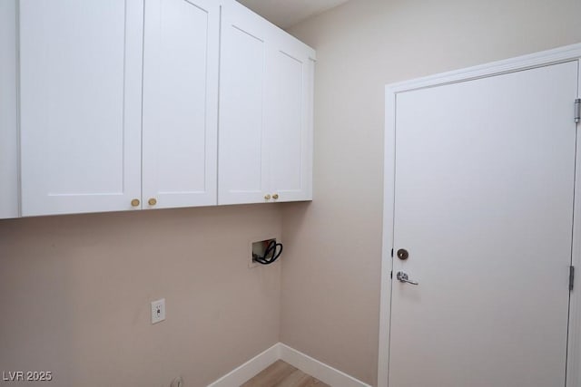 2623 Red Planet St, Henderson, NV 89044 - laundry room featuring cabinet space, hookup for a washing machine, baseboards, and light wood finished floors