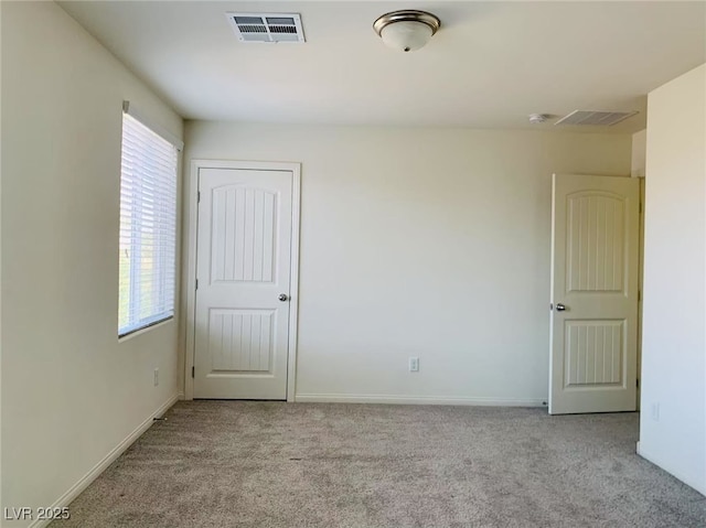 8793 Candelabra Ct, Las Vegas, NV 89148 - unfurnished room featuring healthy amount of natural light, carpet, and baseboards