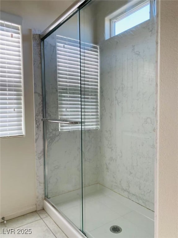 8793 Candelabra Ct, Las Vegas, NV 89148 - full bath featuring a stall shower and tile patterned flooring