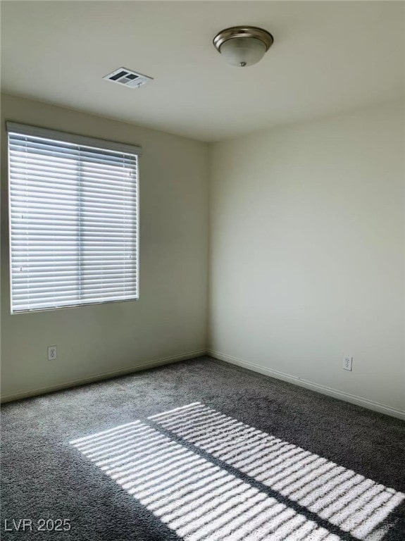8793 Candelabra Ct, Las Vegas, NV 89148 - carpeted empty room with baseboards