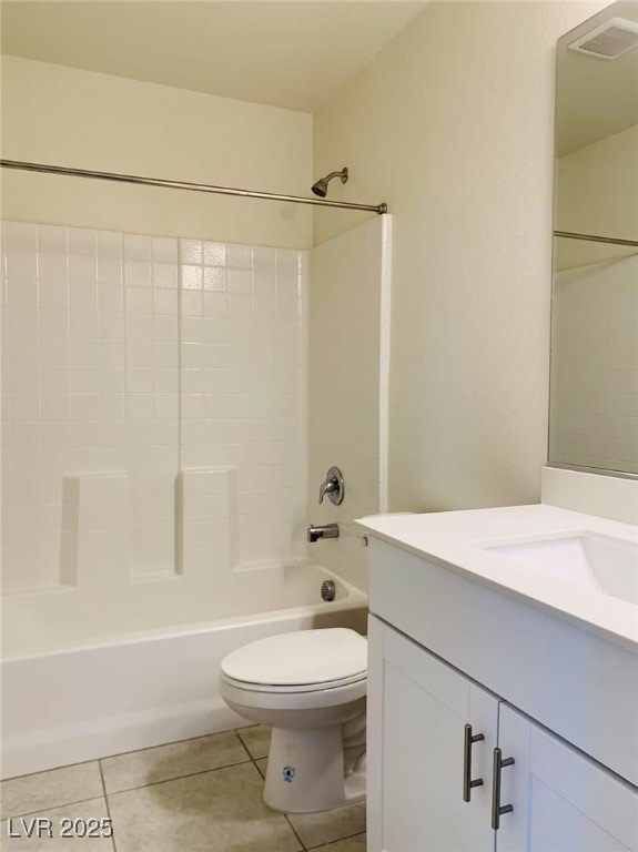 8793 Candelabra Ct, Las Vegas, NV 89148 - full bath featuring toilet, vanity, tile patterned flooring, and washtub / shower combination