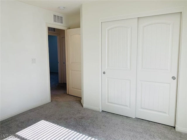 8793 Candelabra Ct, Las Vegas, NV 89148 - unfurnished bedroom featuring carpet floors, a closet, and baseboards