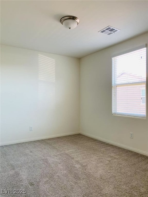 8793 Candelabra Ct, Las Vegas, NV 89148 - spare room featuring carpet flooring and baseboards