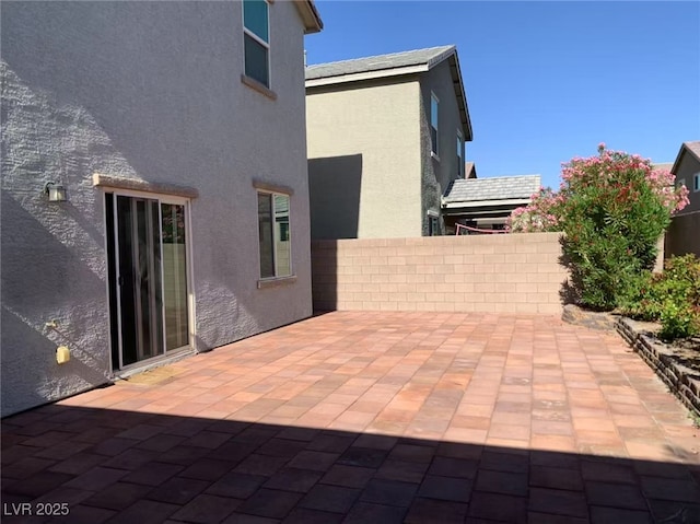 8793 Candelabra Ct, Las Vegas, NV 89148 - fenced backyard featuring a patio