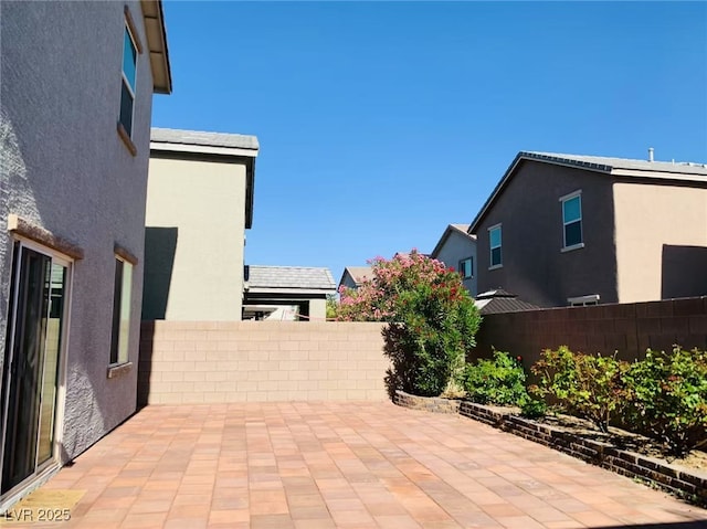 8793 Candelabra Ct, Las Vegas, NV 89148 - fenced backyard featuring a patio
