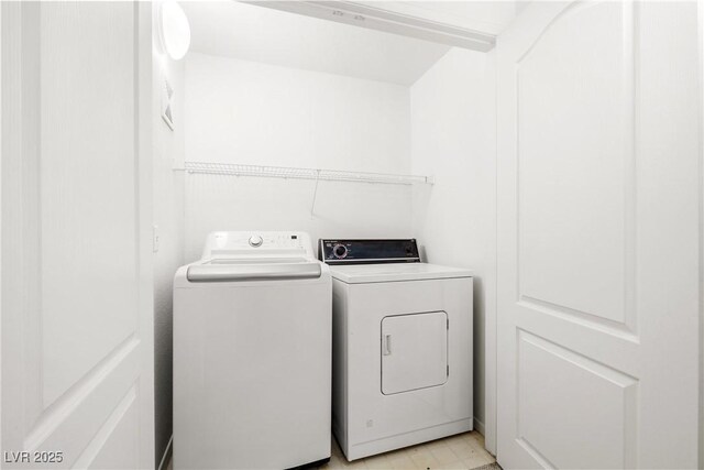 1830 N Buffalo Dr Unit 2014, Las Vegas, NV 89128 - washroom with washing machine and clothes dryer