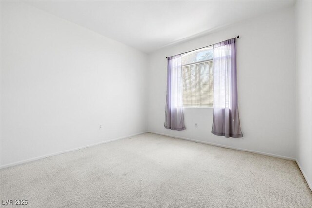 1830 N Buffalo Dr Unit 2014, Las Vegas, NV 89128 - carpeted empty room with baseboards