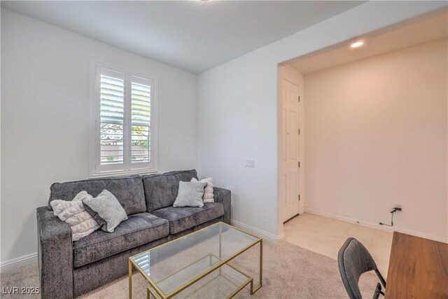 2114 Thelen Ave, North Las Vegas, NV 89086 - carpeted living area featuring baseboards