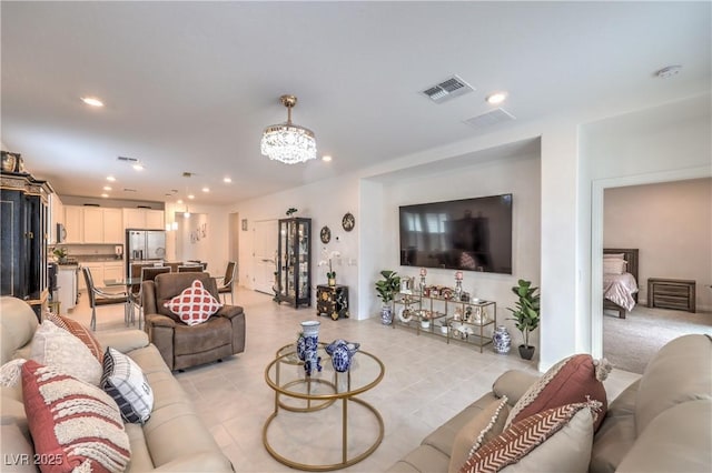 2114 Thelen Ave, North Las Vegas, NV 89086 - living room with recessed lighting, a chandelier, and light tile patterned flooring