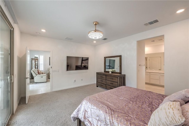 2114 Thelen Ave, North Las Vegas, NV 89086 - bedroom featuring light colored carpet, recessed lighting, baseboards, and connected bathroom