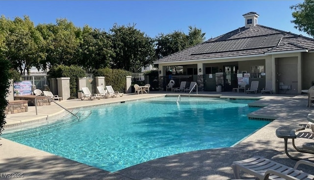 8218 Golden Flowers St, Las Vegas, NV 89139 - community pool featuring a patio area