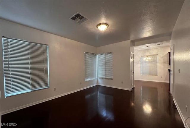 8218 Golden Flowers St, Las Vegas, NV 89139 - empty room featuring baseboards and wood finished floors