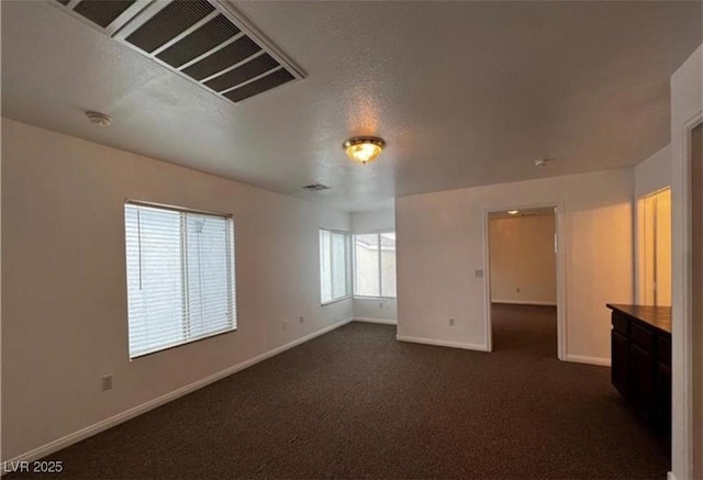 8218 Golden Flowers St, Las Vegas, NV 89139 - unfurnished room with baseboards, a smoke detector, and dark carpet
