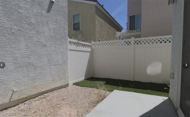 8218 Golden Flowers St, Las Vegas, NV 89139 - fenced backyard featuring a patio